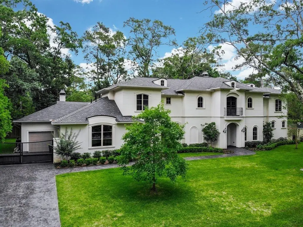 12 Valley Forge Drive, a white stucco estate home in Bunker Hill Village sold by Ten81 Realty